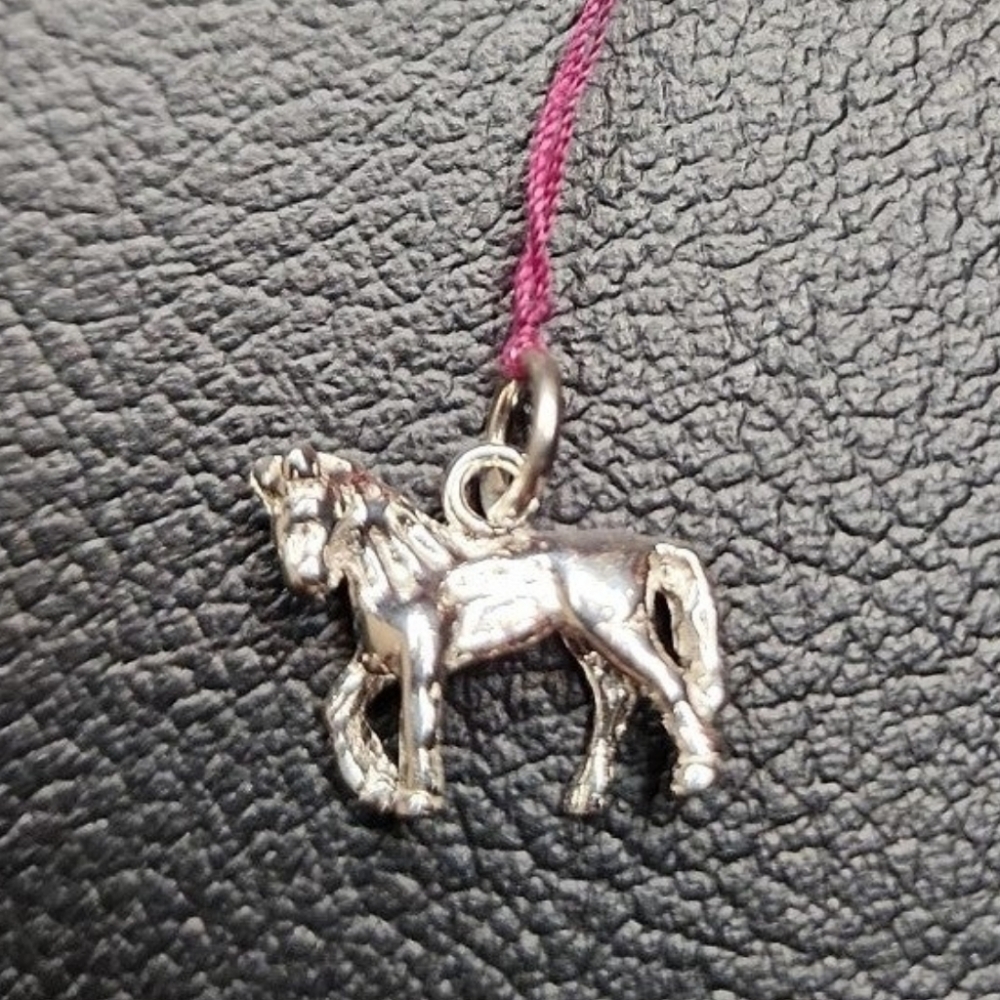 Sterling Silver Horse Charm .5 inch by .5 inch.